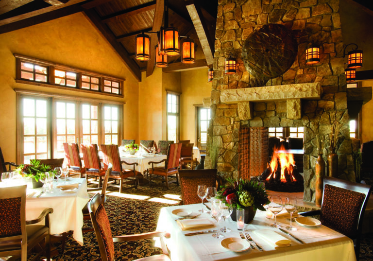 Inside a restaurant with fine dining and a wonderful fireplace,Pronghorn Golf Resort, Bend, Oregon, USA