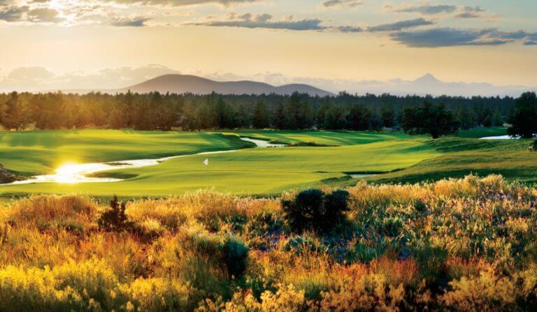 Image depicting the 6th hole and surrounding landscape behind the Tom Fazio designed Golf Course at Pronghorn Golf Resort, Bend, Oregon, USA