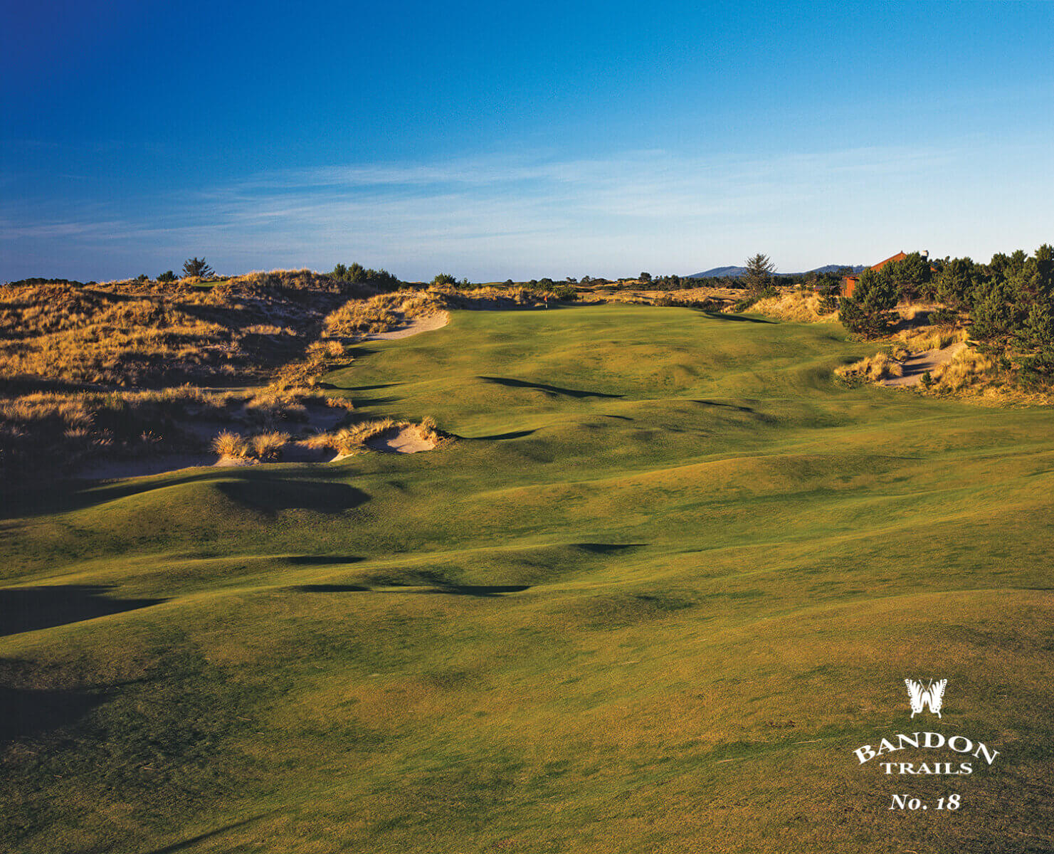 The sun sets on the 18th fairway at Bandon Trails Golf Course, Bandon Dunes Golf Resort, Oregon, USA