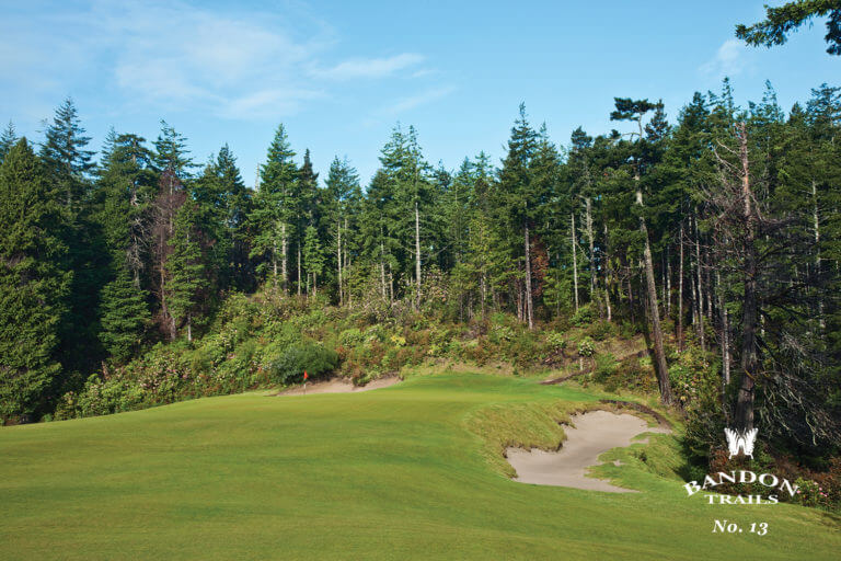 Image overlooking the 13th green surrounded by tall pine trees, Bandon Trails Golf Course, Bandon Dunes Golf Resort, Oregon, USA