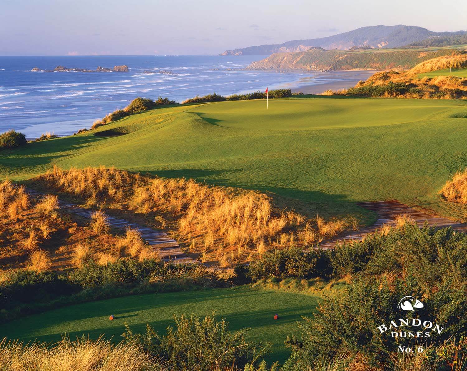 Image of the 6th hole as the sun sets on the Bandon Dunes Golf Course, Bandon, Oregon, USA