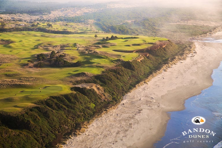 Image of the Bandon Dunes golf course contrasted with the beach and Pacific Ocean, Bandon Dunes Golf Resort, Oregon, USA