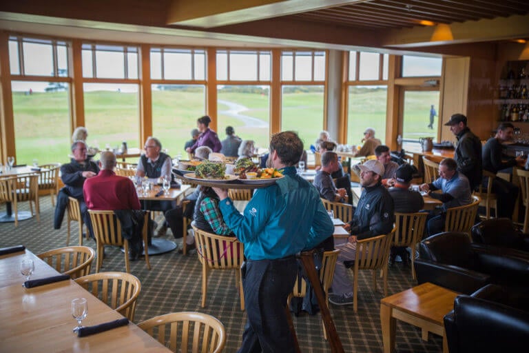 Image of the restaurant and golf view from the Tufted Puffin Restaurant, Bandon Dunes Golf Resort, Oregon, USA