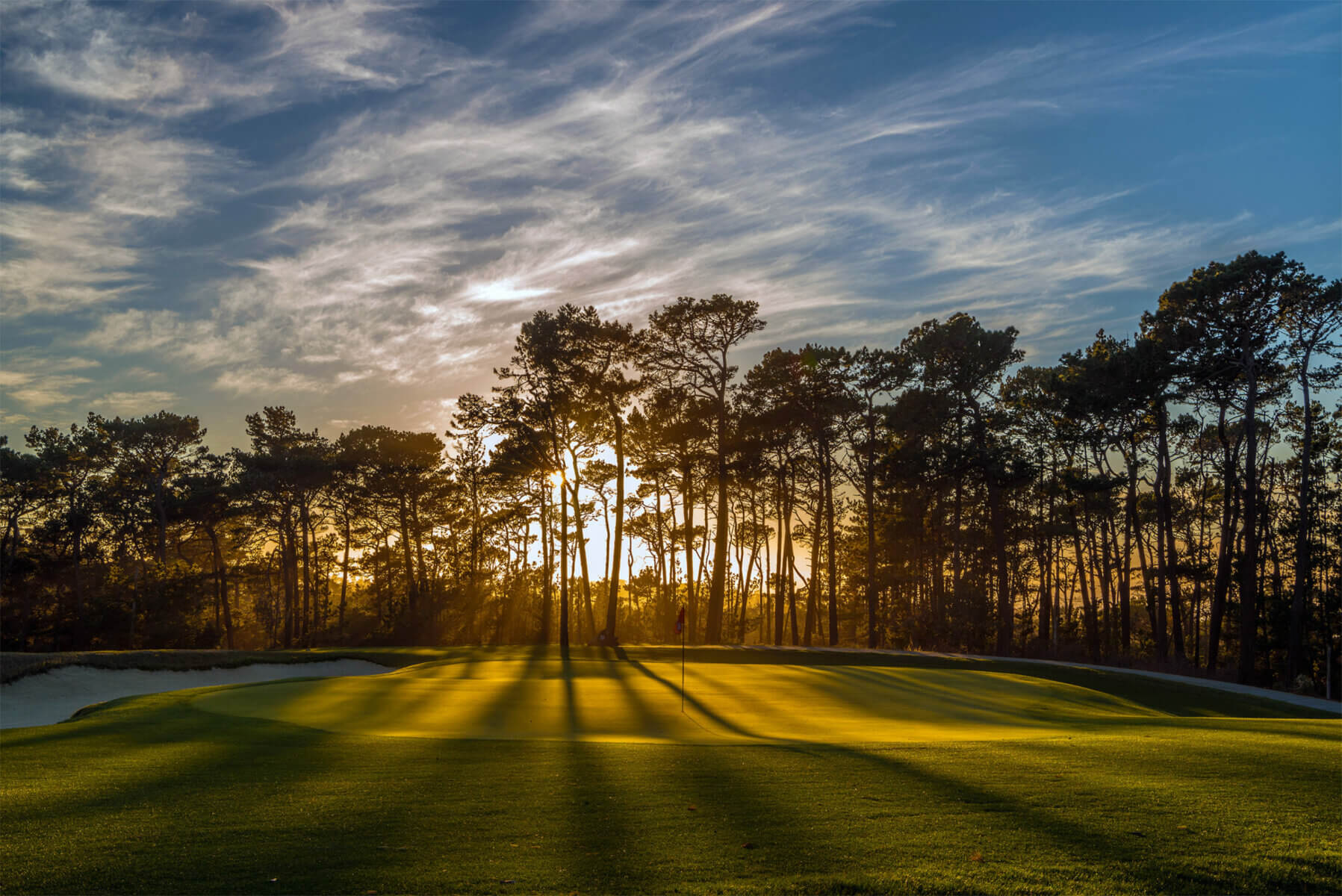 Image of the 15th hole at sunset, Pebble Beach, USA