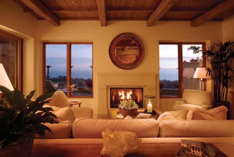 Image of a fireplace and living area of a villa, Pelican Hill Resort, Newport, California, USA