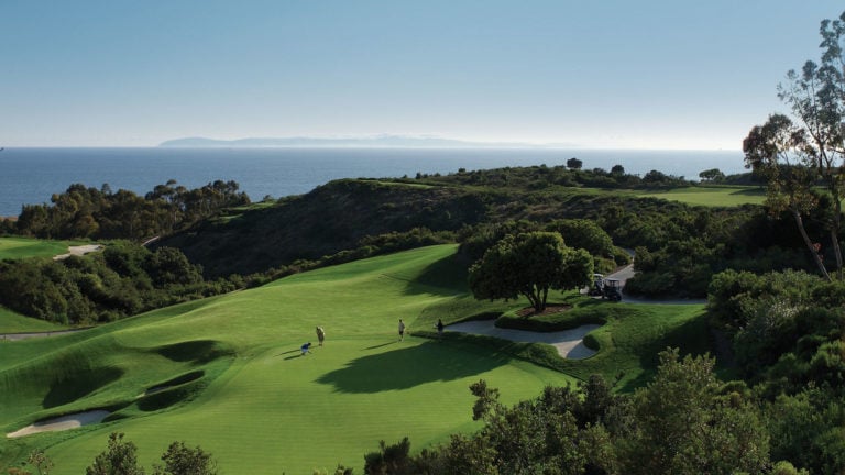 Aerial image of golfers playing on the North Course, Pelican Hill Resort, Newport, California, USA