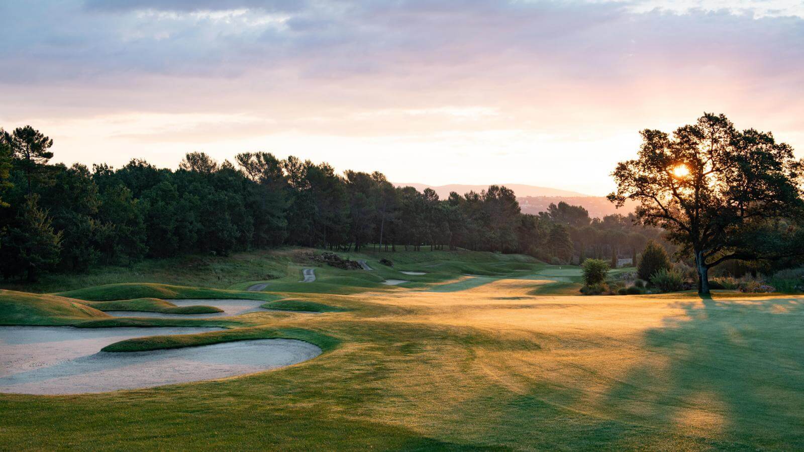 Image of the sunrise over Le Riou Golf Course, Terre Blanche Resort, Tourrettes, France