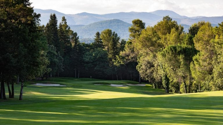 Image of a green surrounded by trees, Terre Blanche Golf Resort, Tourrettes, France