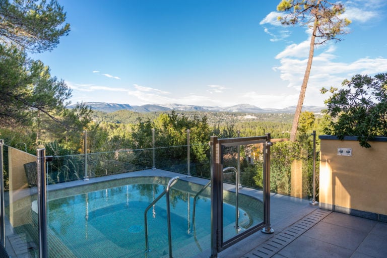 Image of a jacuzzi and its mountain view, Terre Blanche, Tourrettes, French Riviera