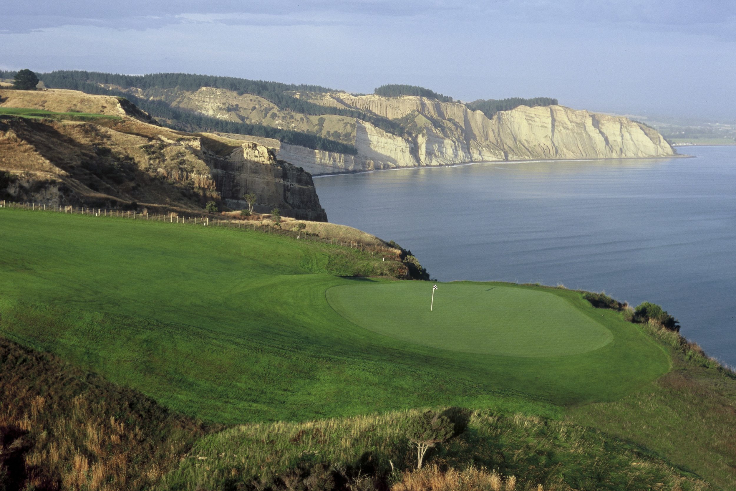 View of the 15th green and white cliffs, Cape Kidnappers, Hawke's Bay, New Zealand