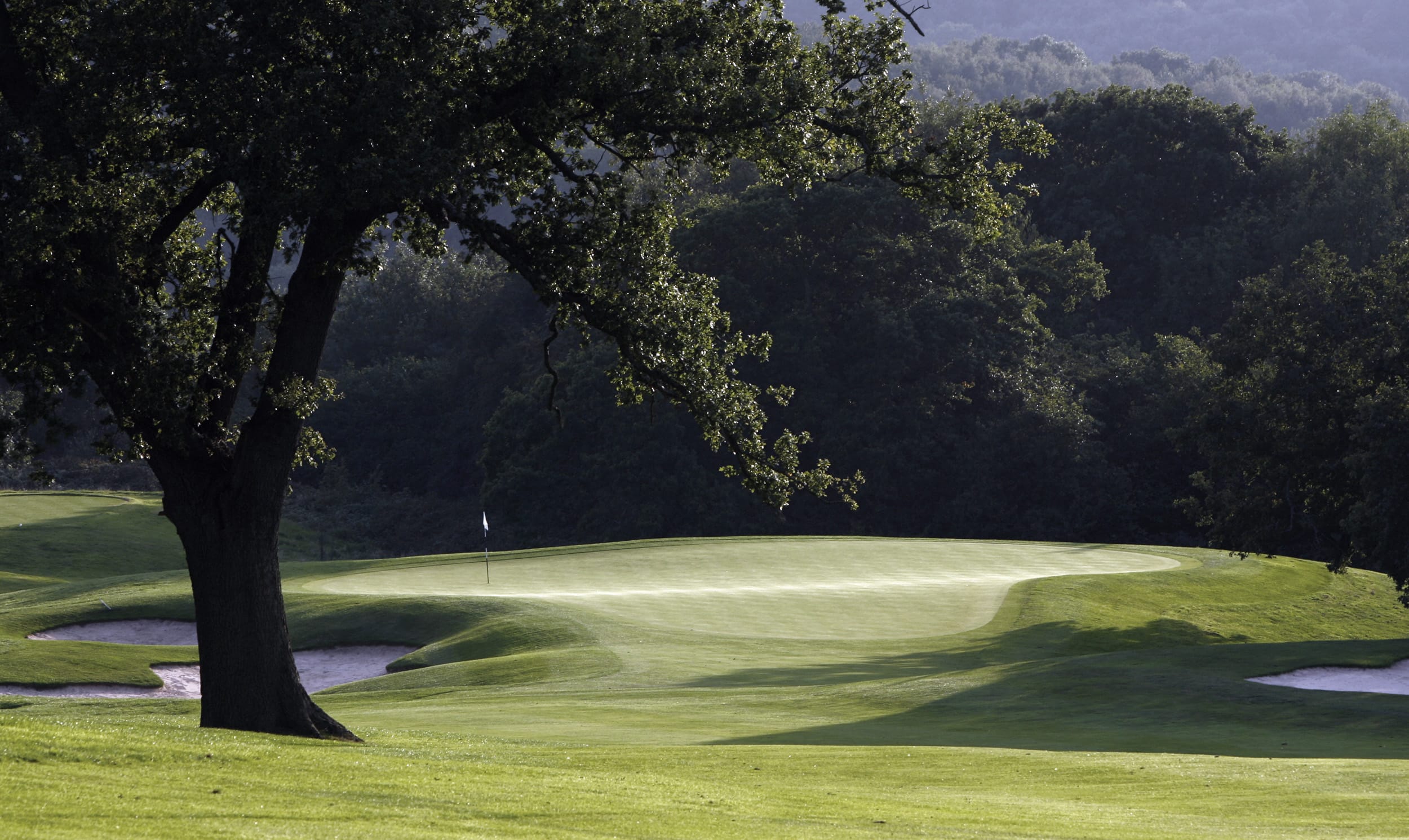 View downhill of a fairway on the Roman Road Course, The Celtic Manor Resort, Usk Valley, Wales, United Kingdom