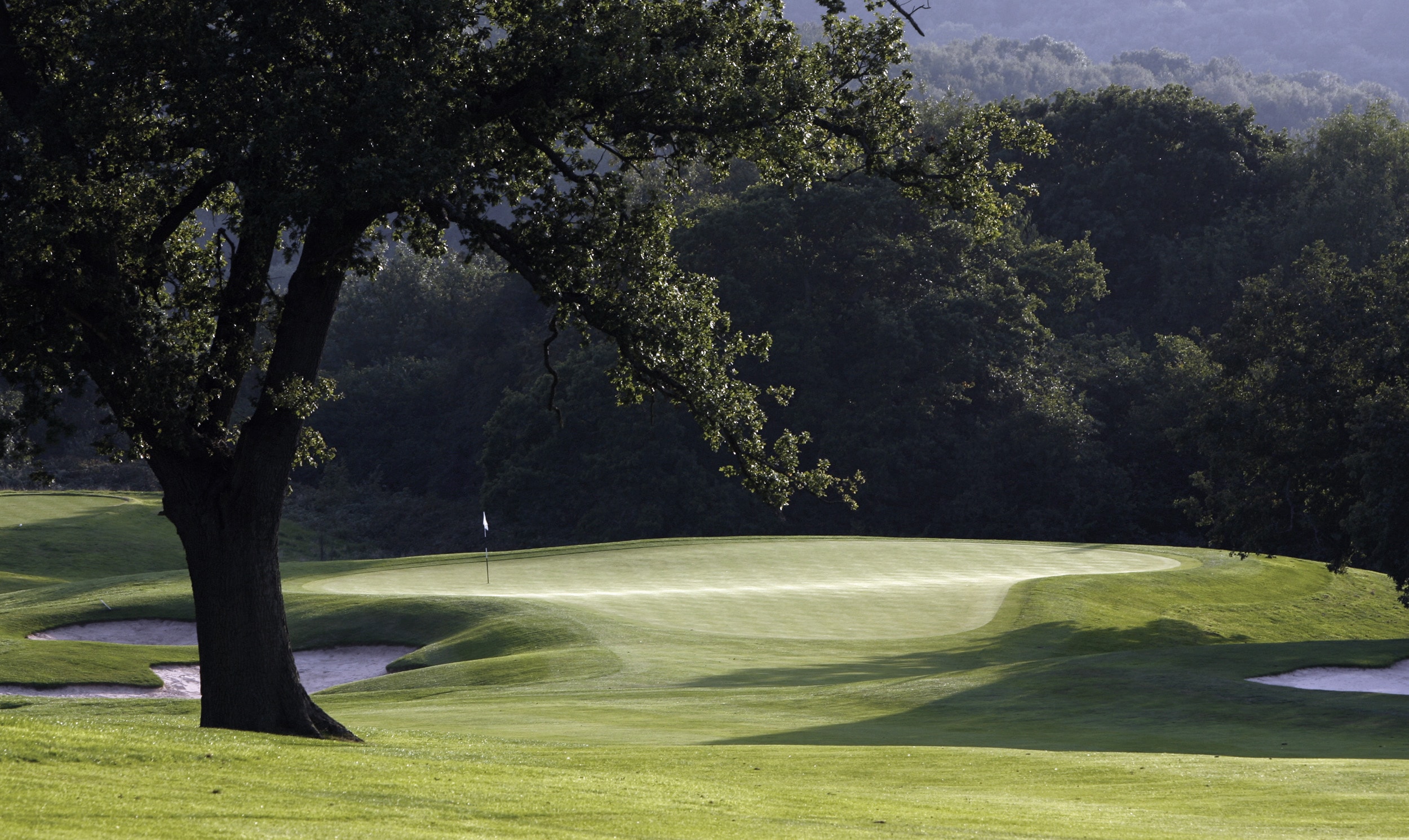 View downhill of a fairway on the Roman Road Course, The Celtic Manor Resort, Usk Valley, Wales, United Kingdom