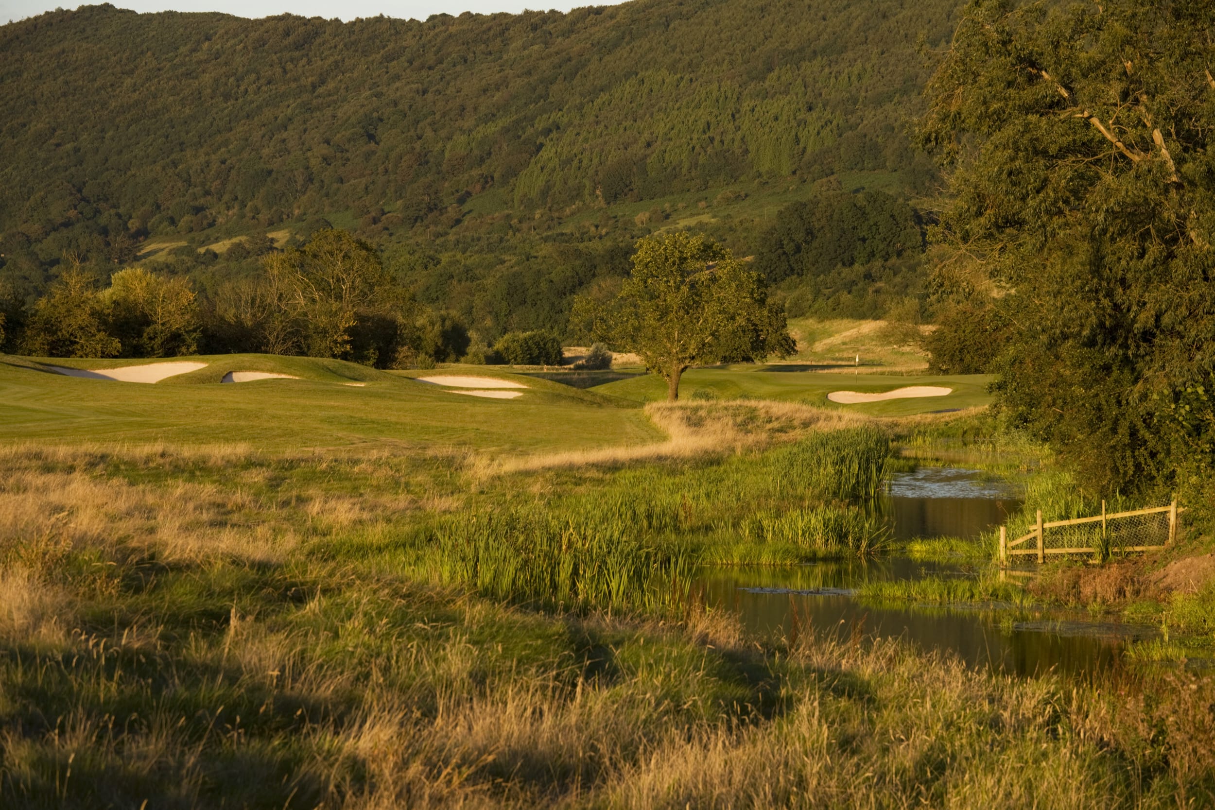 Depicting the Twenty Ten Golf Course bathed in sunlight, The Celtic Manor Resort, Usk Valley, Wales, United Kingdom