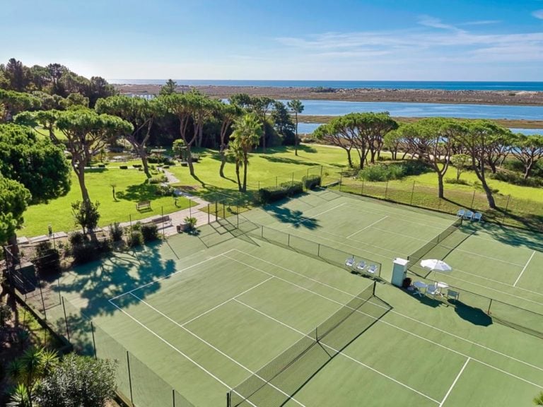 Overlooking the two tennis-courts at Hotel Quinta do Lago, Algarve, Portugal