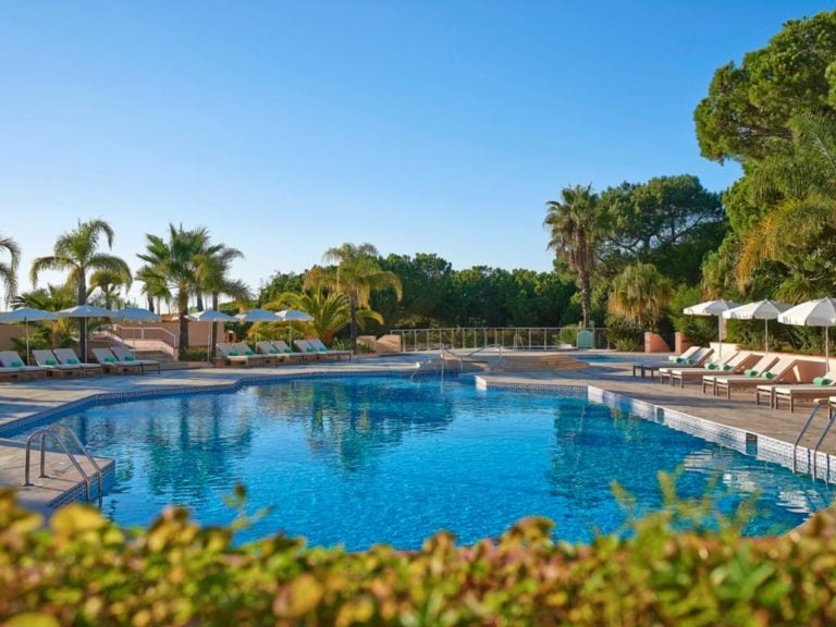 View of the outdoor pool at Hotel Quinta do Lago, Algarve, Portugal