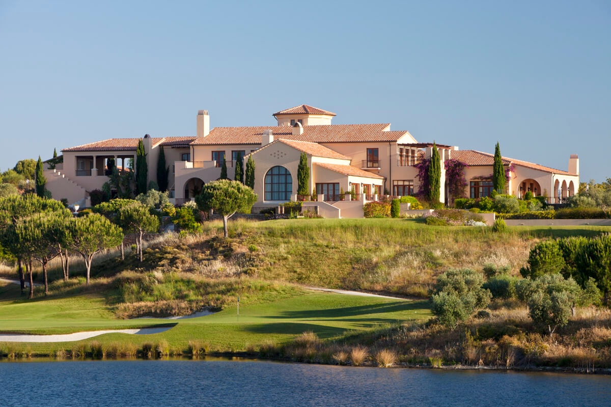Displaying the 18th hole and clubhouse of the Monte Rei Golf & Country Club, Algarve, Portugal