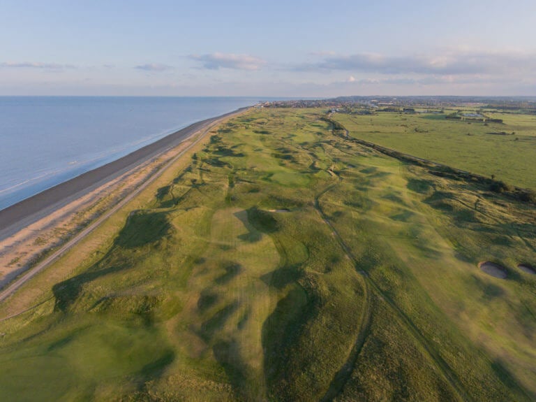 Aerial image of the links golf course adjacent to the English Channel, Royal Cinque Ports Golf Club, Kent, England