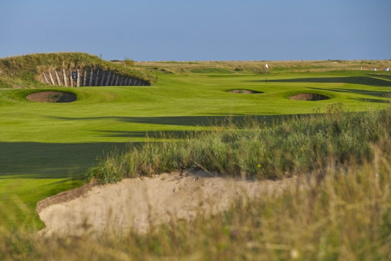 Image of Sarazen's bunker lined with old raiway sleepers on the golf course at Prince's in Sandwich, Kent, England, United Kingdom