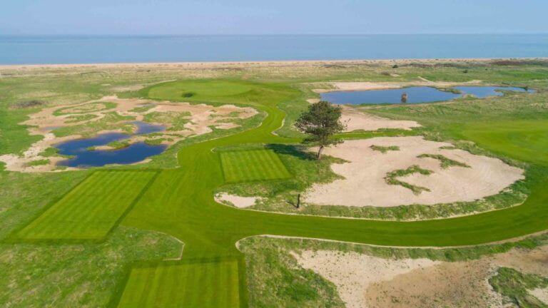 Aerial image of the bloody 5th par-3 on the Himlayas course at Prince's in Sandwich, Kent, England, United Kingdom