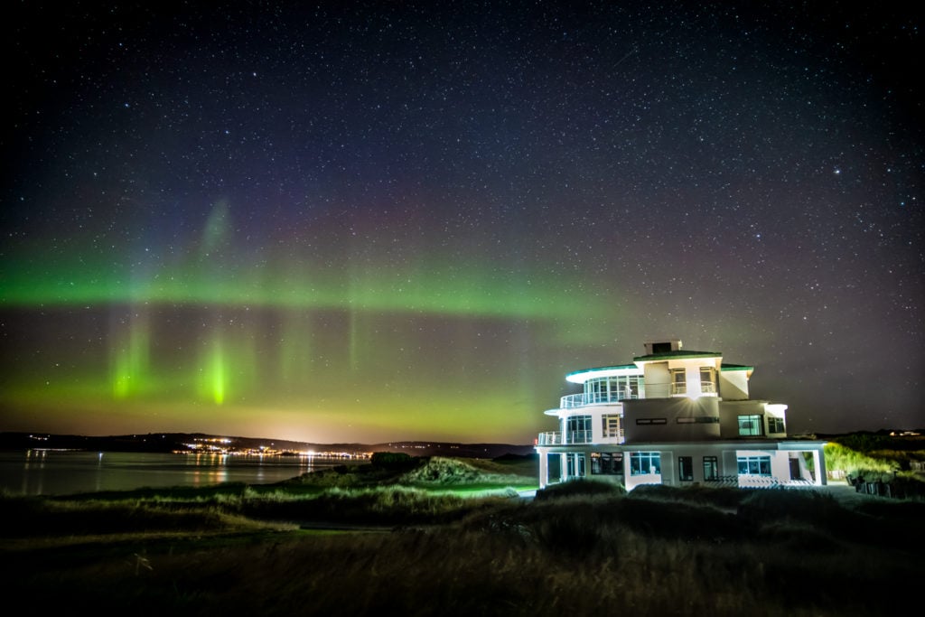 Image of the Northern Lights over the Caslte Stuart Clubhouse, Castle Stuart Golf Links, Inverness, Scotland