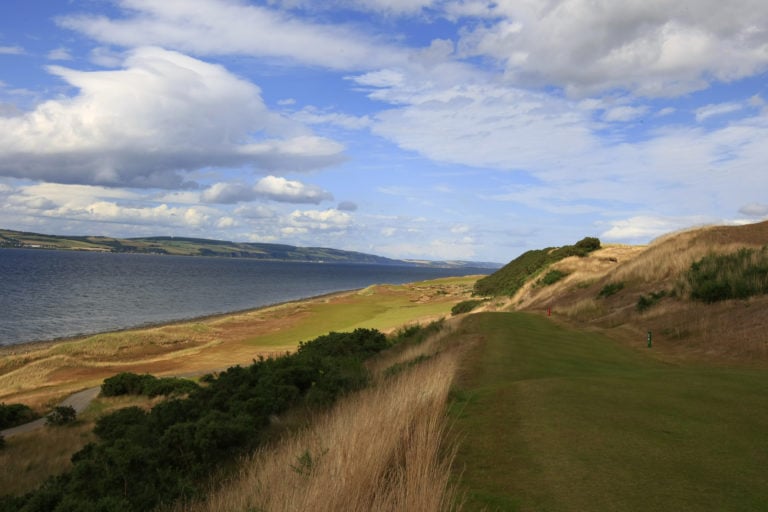 Image overlooking the 10th hole from the top tee with views of the water and rest of golf course below, Castle Stuart Golf Links, Inverness, Scotland