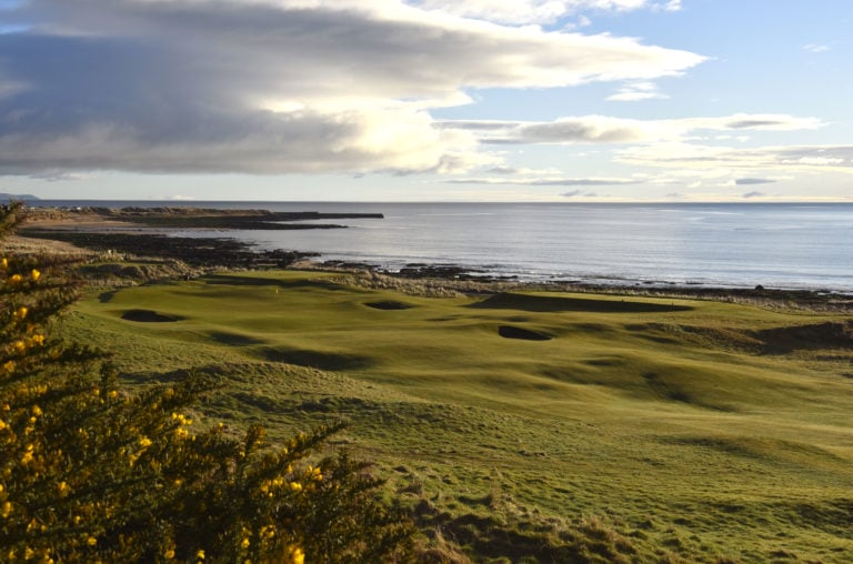 Image overlooking the Dornoch Firth from the par-4 8th hole at Royal Dornoch Golf Club, Scotland