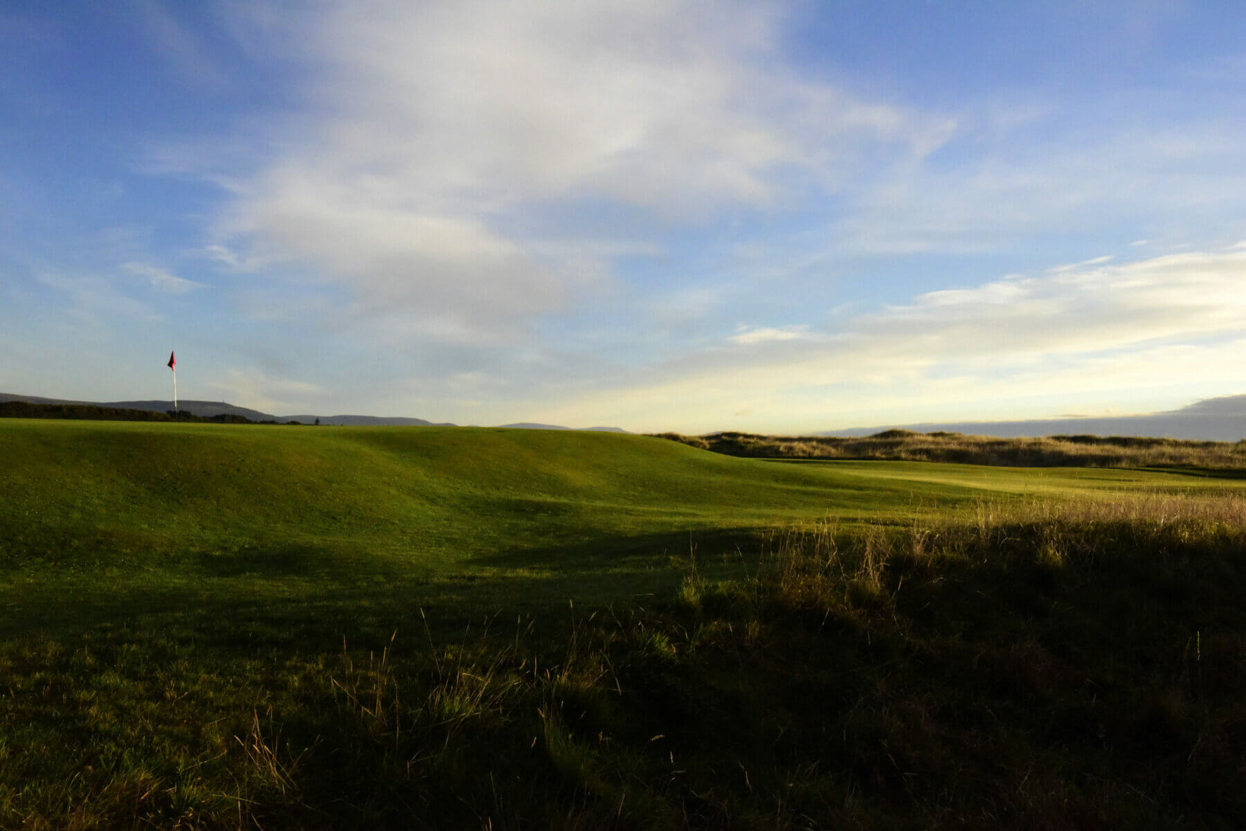 Image overlooking the par-4 14th hole on the Championship course at Royal Dornoch Golf Club, Scotland