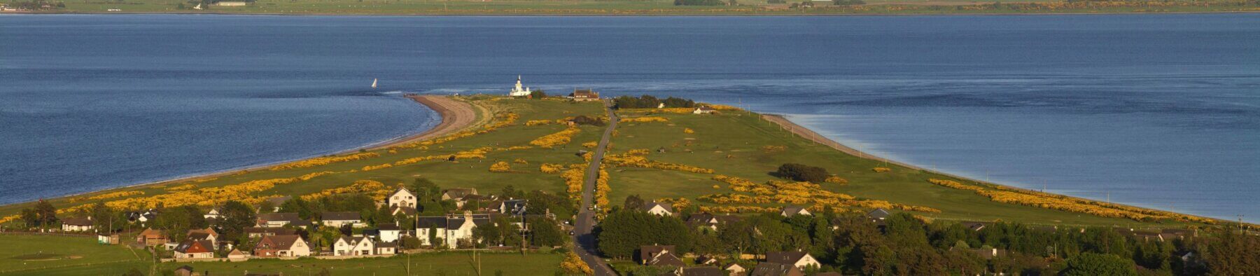 Image of the golf complex surrounded by the Moray Firth, Fortrose and Rosemarkie golf Links, Inverness, Scotland