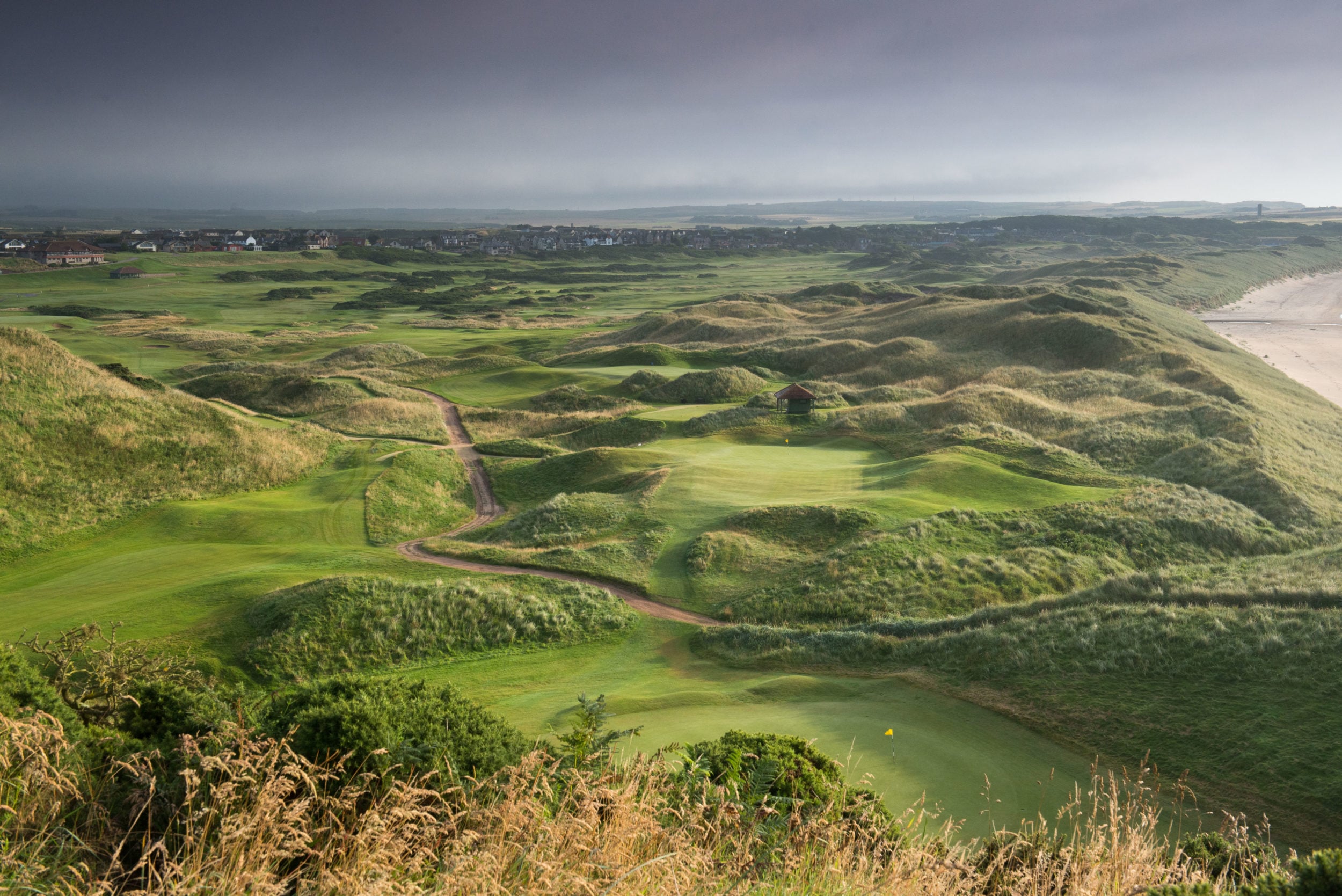Image taken from a tee box looking down on the links golf course at Cruden Bay Golf course, Aberdeenshire, Scotland