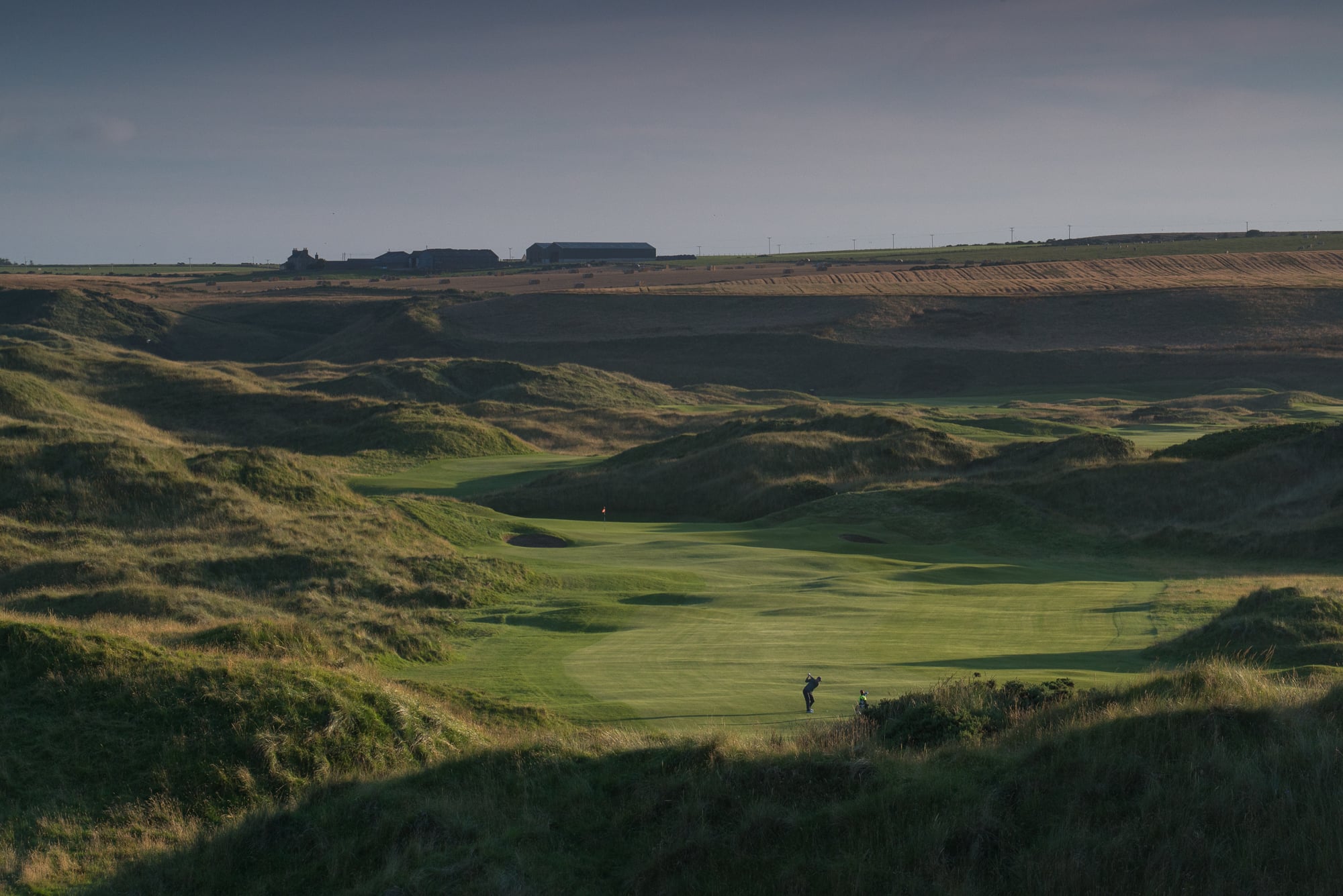 Image of a golfer on the 5th hole of the Cruden Bay Championship Links Golf Course, Aberdeenshire, Scotland
