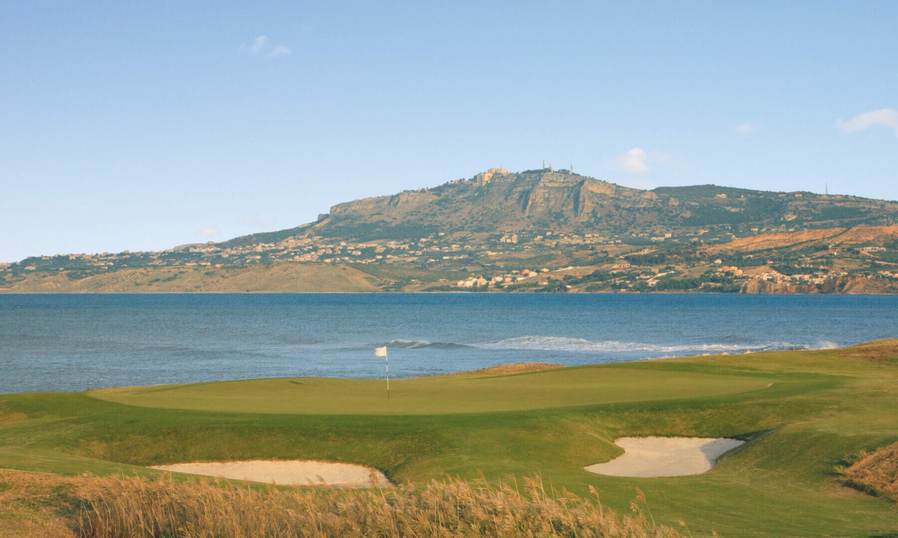 Image overlooking the golf course adjacent to the beach at Verdura Resort, Sicily, Italy