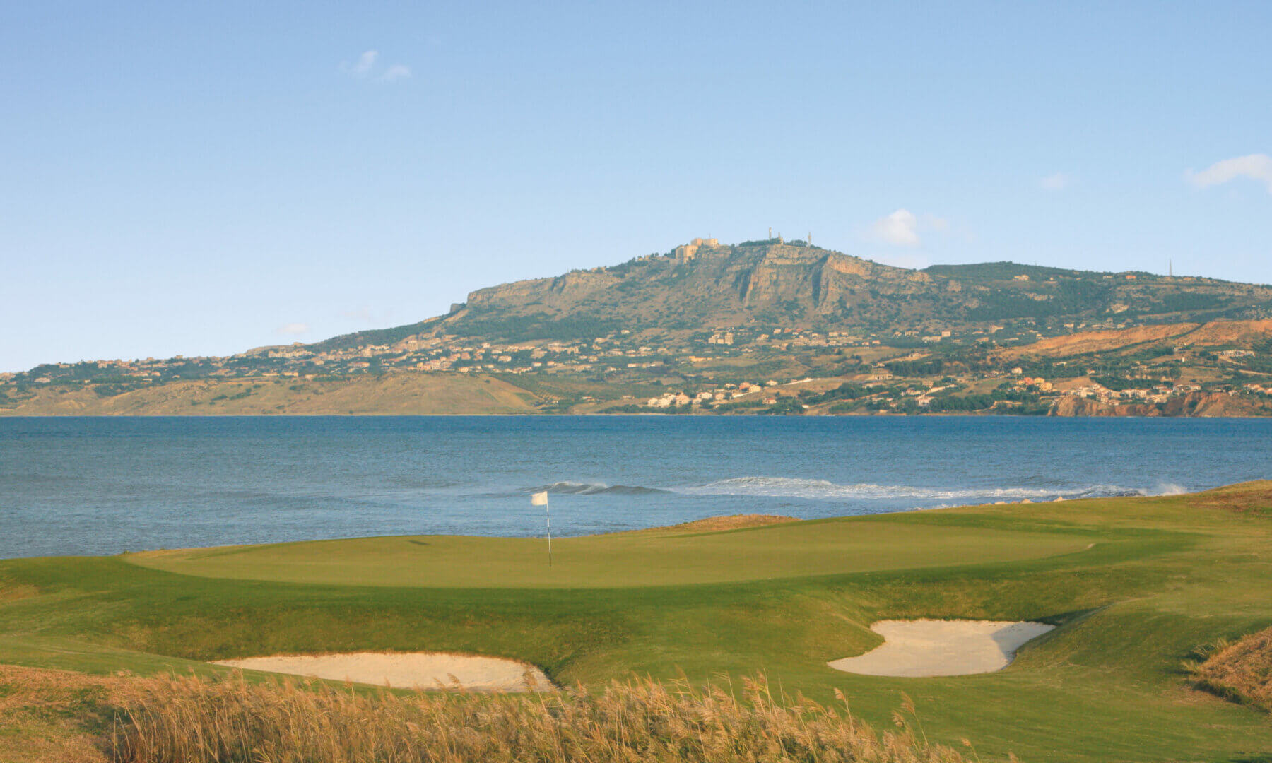 Image overlooking the golf course adjacent to the beach at Verdura Resort, Sicily, Italy