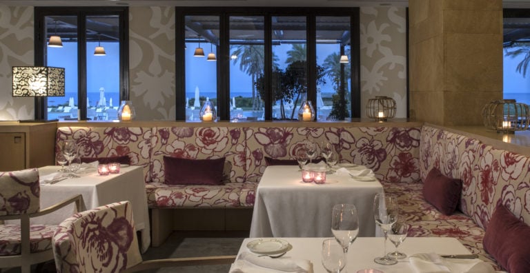 Image depicting the pink interior of the zagara Restaurant at Verdura Resort, Sicily, Italy