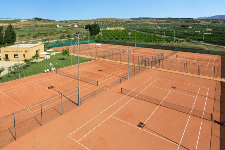 Aerial image of clay tennis courts at Verdura Resort, Sicily, Italy