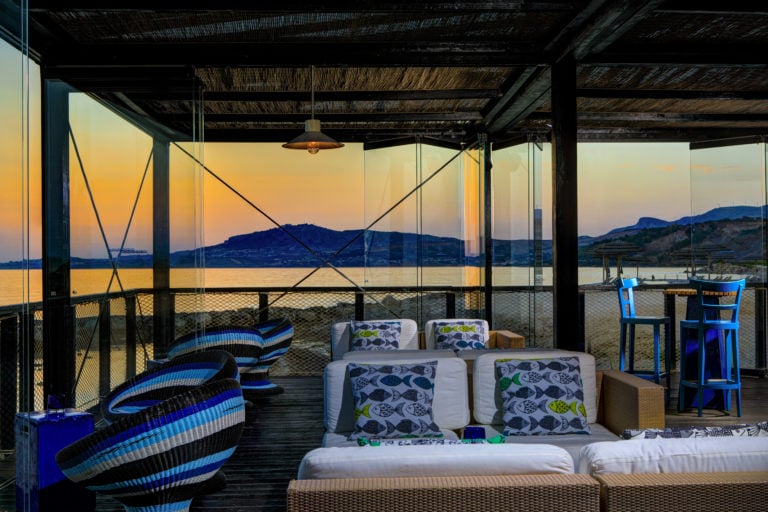 Image depicting dusk from the inside of Amare Restaurant at Verdura Resort, Sicily, Italy
