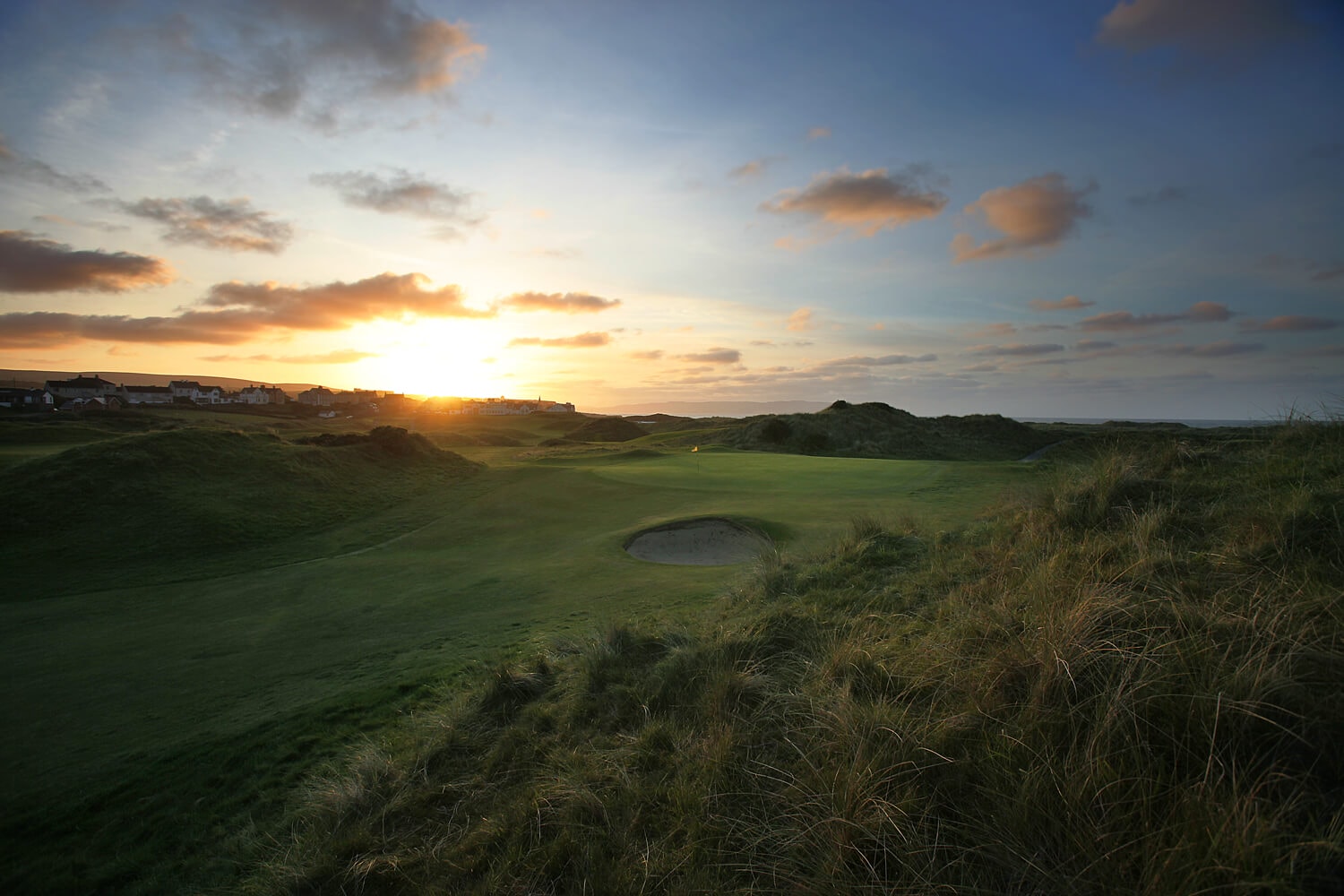Image of the 17th green at sunset at Castlerock Club, Northern Ireland