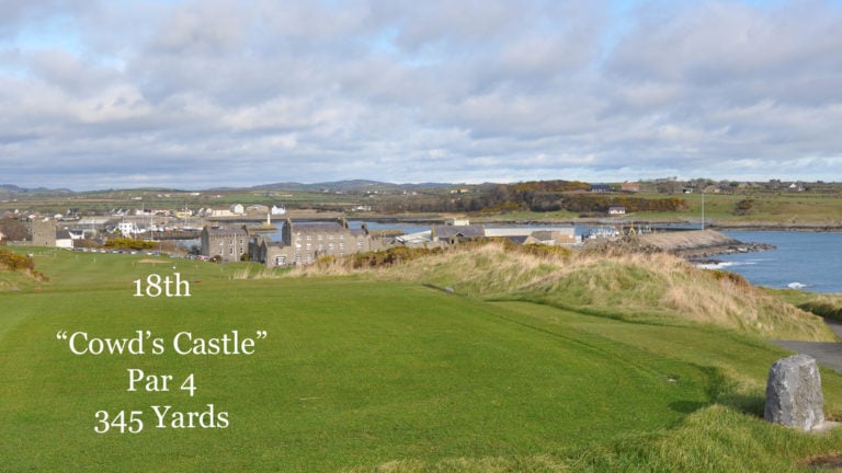 Image of the memorable 18th hole looking at the ancient clubhouse at Ardglass Golf Club, Northern Ireland