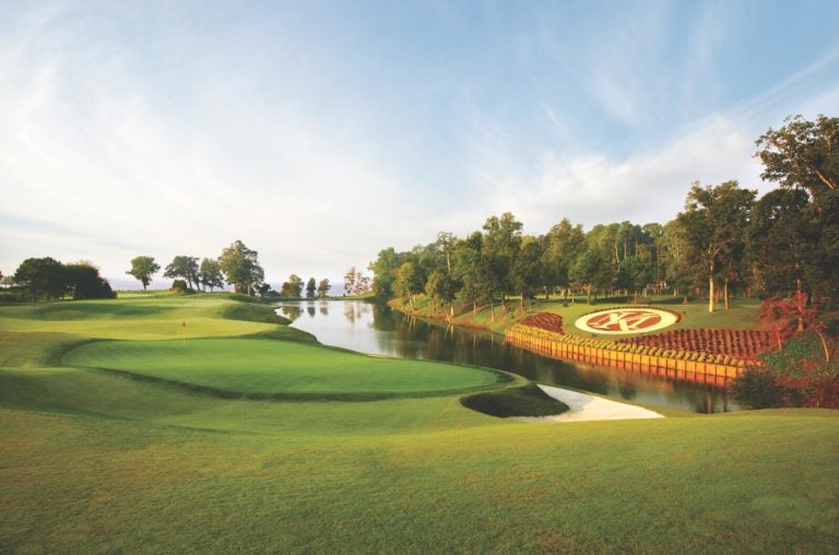 Image depicting the green of the 18th hole and resort logo, Kingsmill Resort, Williamsburg Virginia, USA