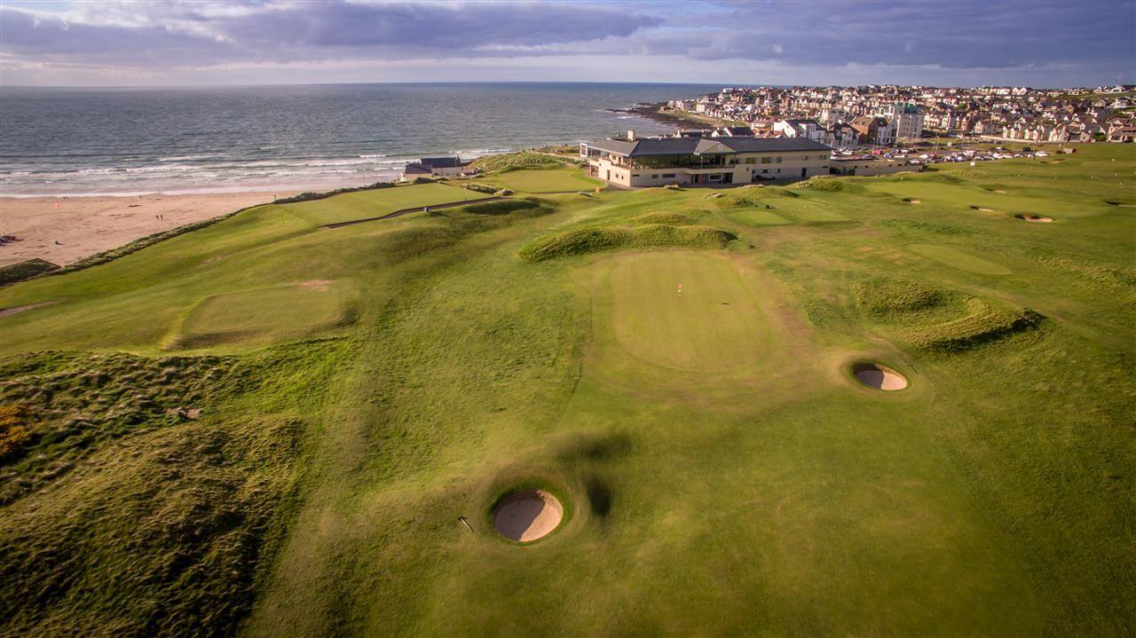 Aerial image of the Portstewart Golf Club and nearby town