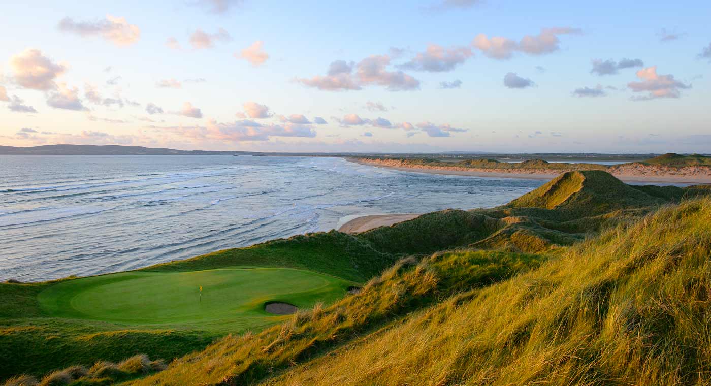 Image overlooking the 4th hole and sea in the background at Tralee Golf Club, County Kerry, Ireland