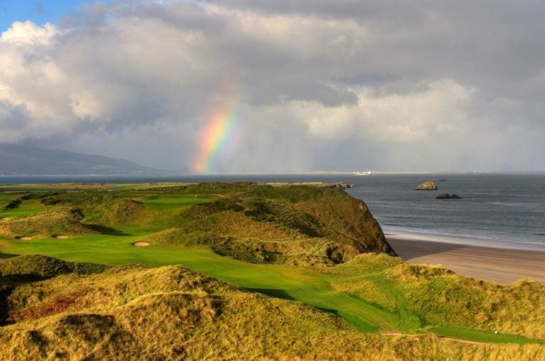 Image of a rainbow over the golf course at Tralee Golf Club, County Kerry, Ireland