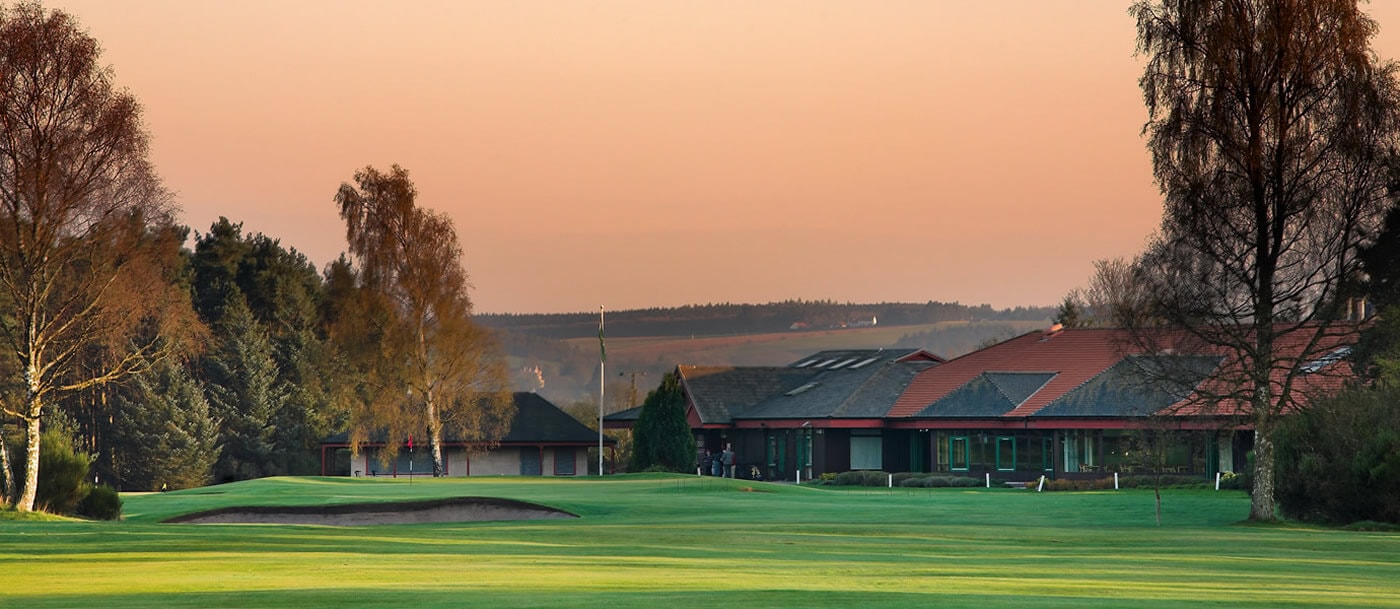 Sunset image of the 18th fairway and clubhouse at Ladybank Golf Club, Fife, Scotland