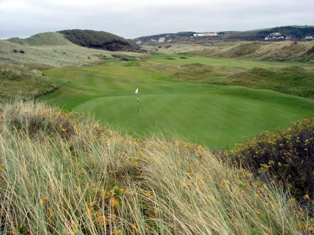 View of the 2nd green from above on the Valley course at Portrush