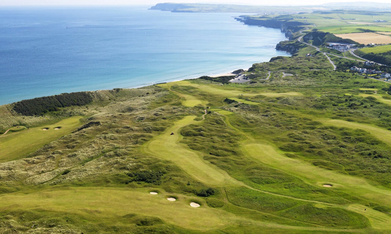 Aerial image of the golf course complex and neighbouring ocean at Royal Portrush Dunluce Golf Course, Portrush, County Antrim, Northern Ireland