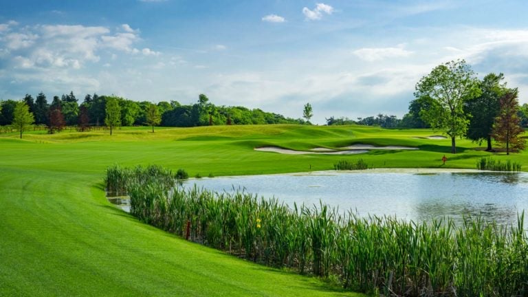 Image depicting the 5th hole and large lake on the golf course at Adare Manor, County Limerick, Ireland, Europe