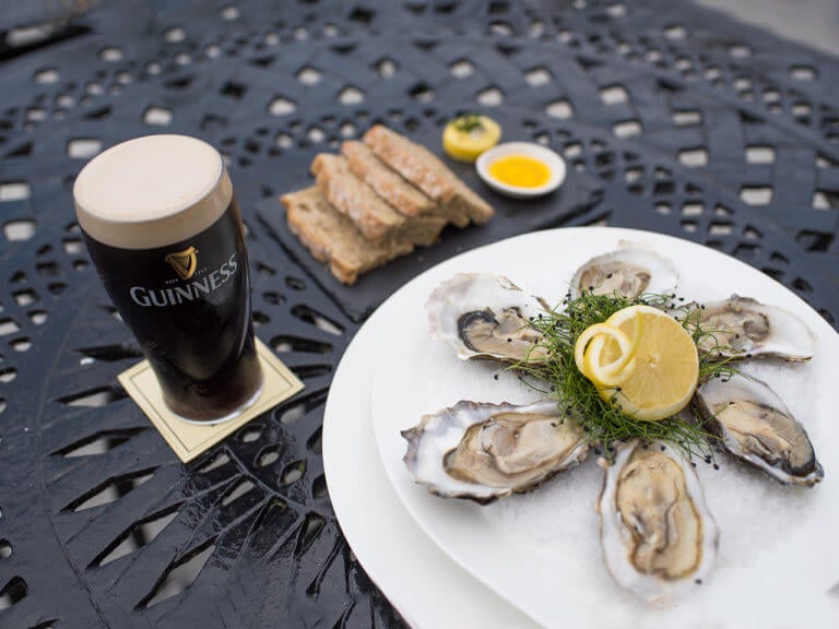 Image depicting a glass of Guinness and a plate of oysters at Lough Erne Resort, Fermanagh Count,Northern Ireland, United Kingdom