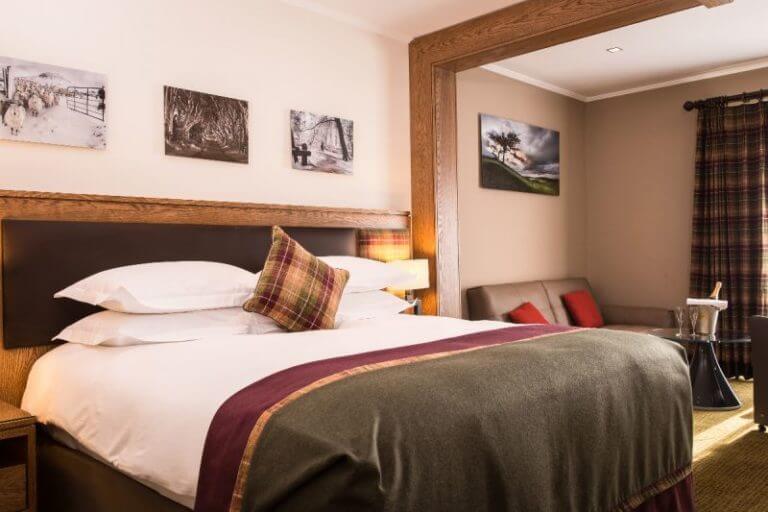 Image of a deluxe room bed, Galgorm Resort, County Antrim, Northern Ireland