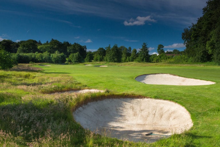 Image looking up the fairway with its put bunkers on the golf course at Galgorm Resort, County Antrim, Northern Ireland