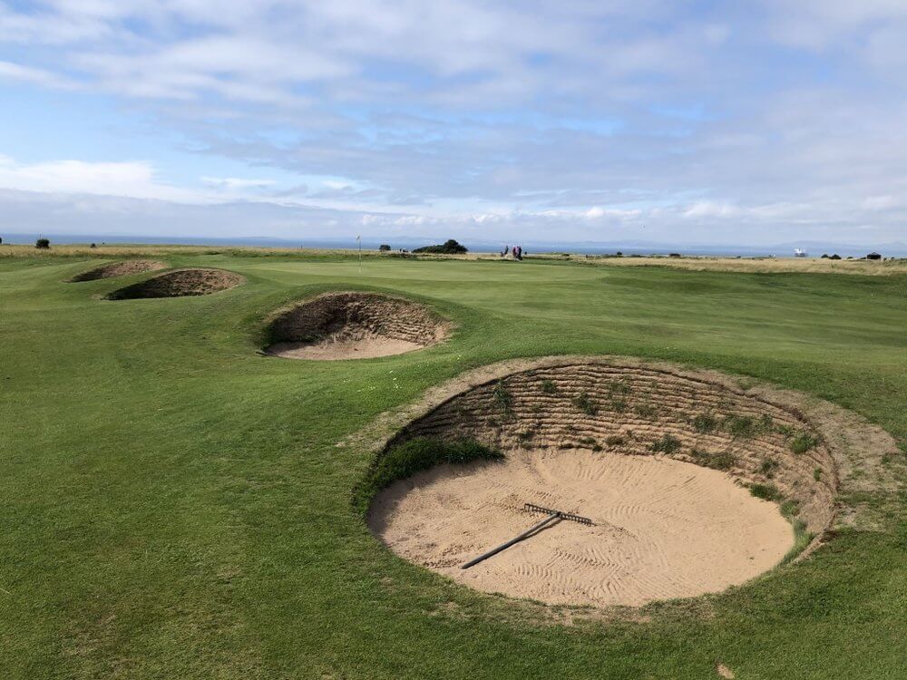 Image displaying various pot bunkers on the approach to a green at Gullane No.2 Golf Course, East Lothian, Scotland, United Kingdom