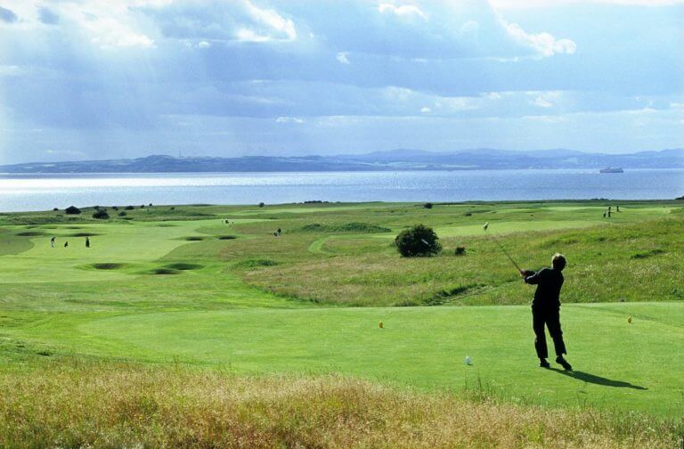 Image of a golfer teeing off on the Gullane No.1 Golf Course, East Lothian, Scotland